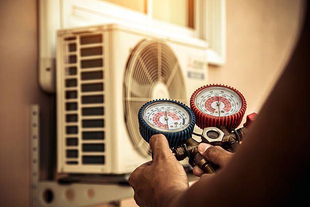 Professional Air Conditioning Service technician working in Equality, AL